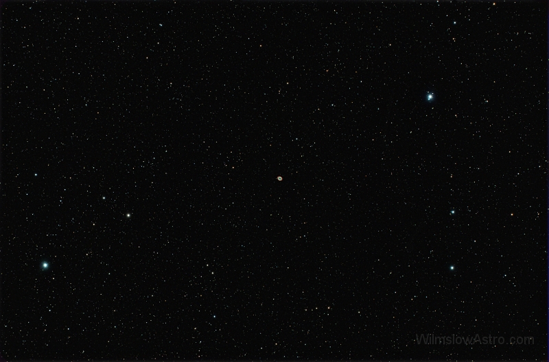 m57_5minx9_070525.jpg -    Object:   M57 Ring Nebula     Date:   May 25th 2007     Instrument:   SV4 Apo     Camera:   QHY-8     Exposure:   9x 5 minutes     Filters:   IDAS LPS     Comments:   A fun shot whilst the Moon was up and through passing high cloud. I was surpised to see two stars resolved in the centre of M57 in this wide field unsharpened shot.  
