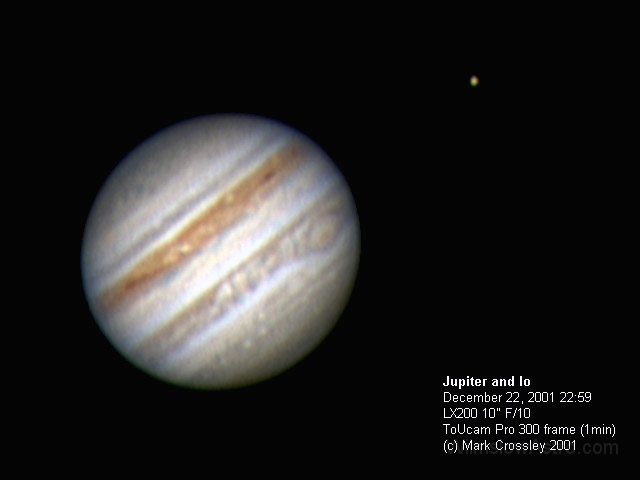 jup011222c.jpg -    Object:   Jupiter     Date:   December 22nd 2001     Instrument:   LX200 10" f/10     Camera:   Toucam     Exposure:   300 frames of a 1 minute video     Filters:   Baader IR Blocking     Comments:   Jupiter and Io, processed June 2002 in Registax. Just shows how the post processing techniques can improve a picture.  